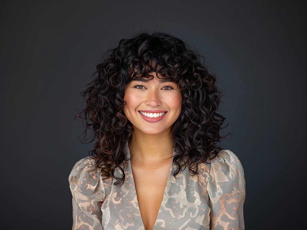 Beautiful face framing curly hair for women