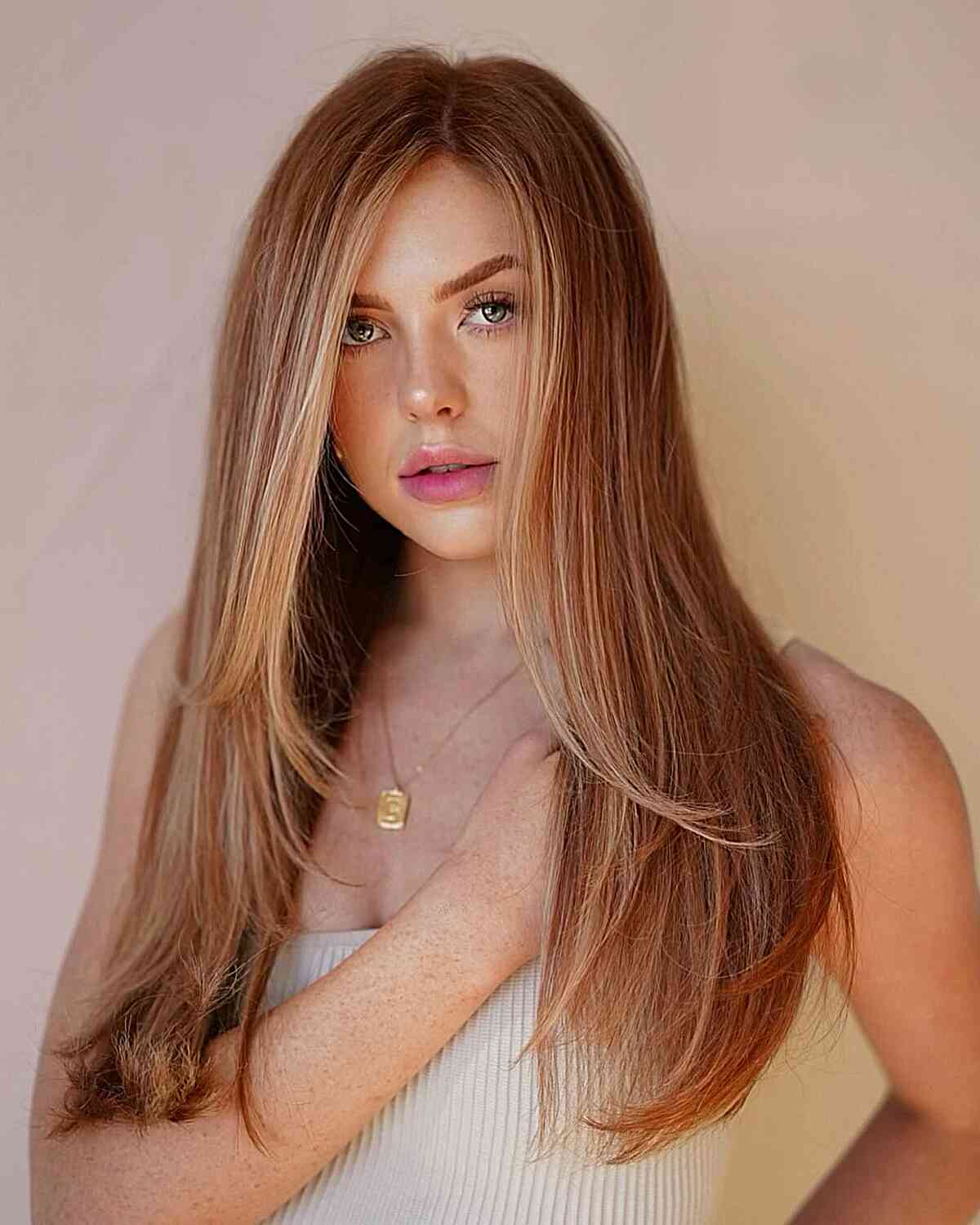Beautiful Long Red Hair with a Blonde Money Piece Highlights and a Middle Part for Thin Hair