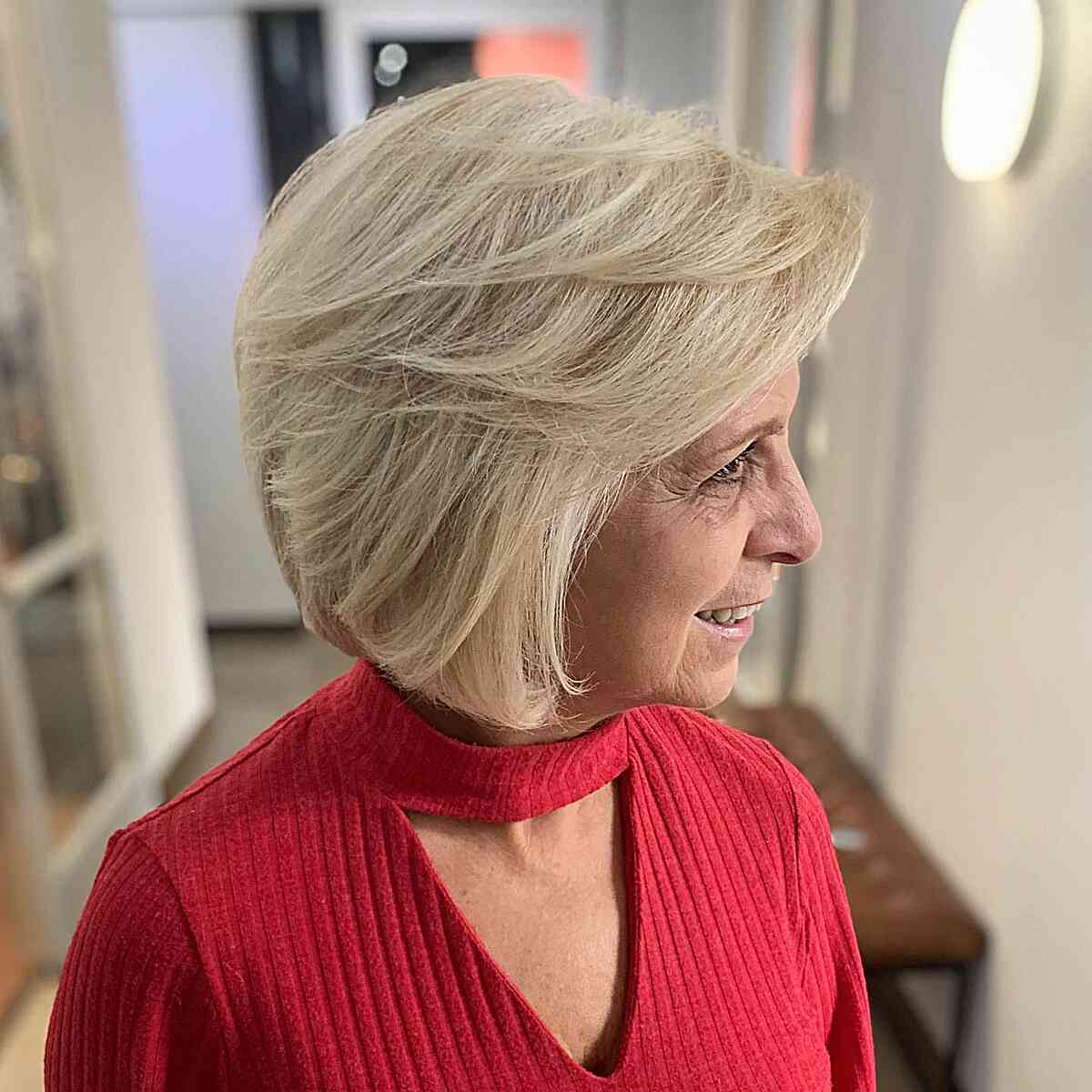 Beautifully Feathered Stacked Bob for older ladies with thick hair