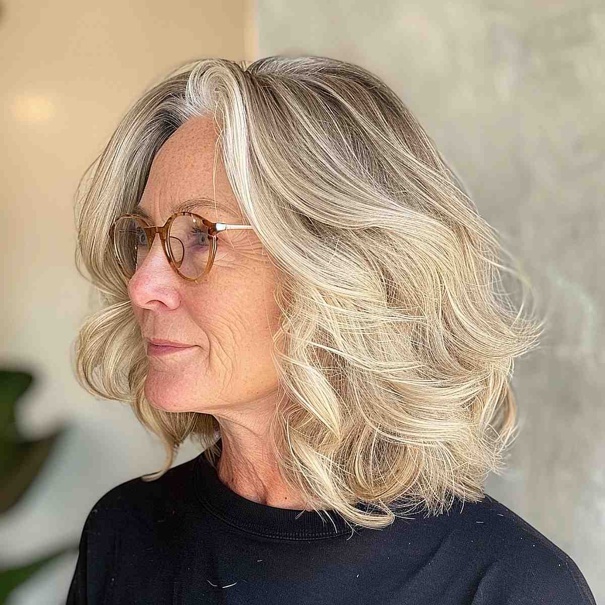 Beige blonde hair color with glasses for 50-year-olds