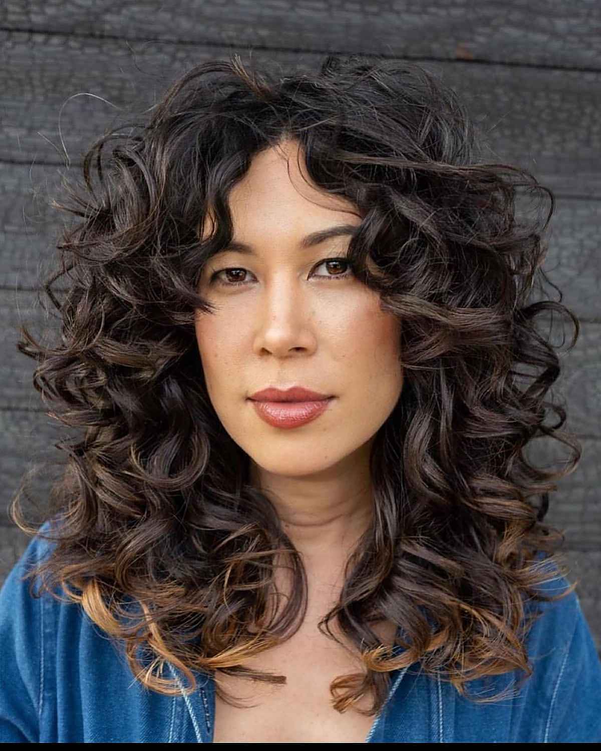 21 Best Ways to Get Curtain Bangs for Curly Hair Right Now