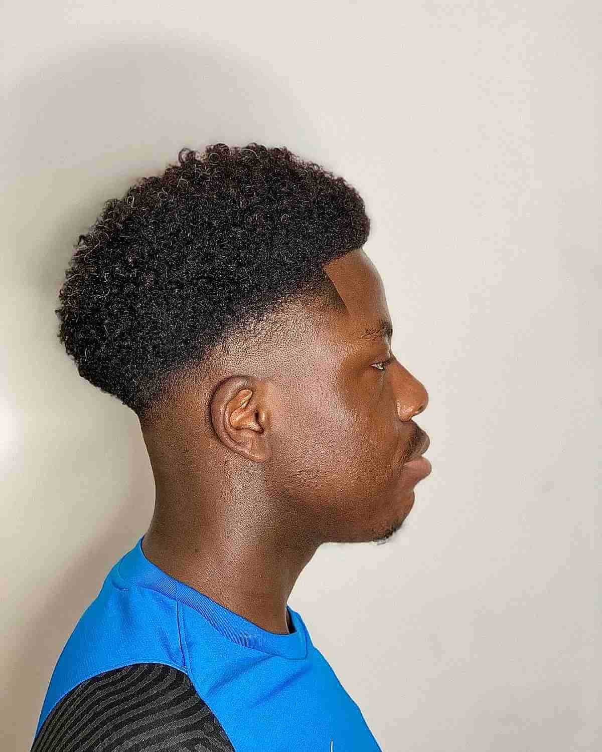 Black Afro with Curly Bald Fade