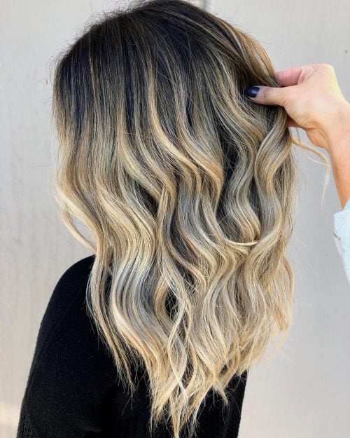 Wavy Black Hair with Cool Blonde Highlights