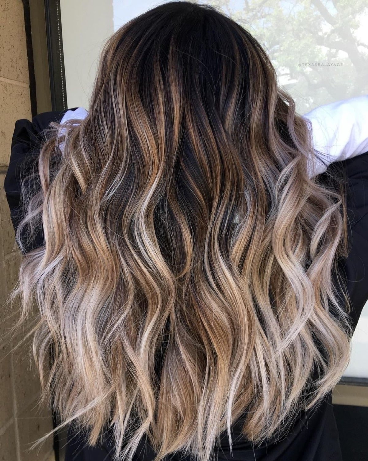 Gorgeous Black hair with blonde ombre highlights