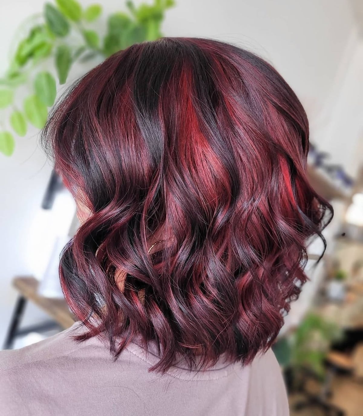 Black hair with chunky red highlights