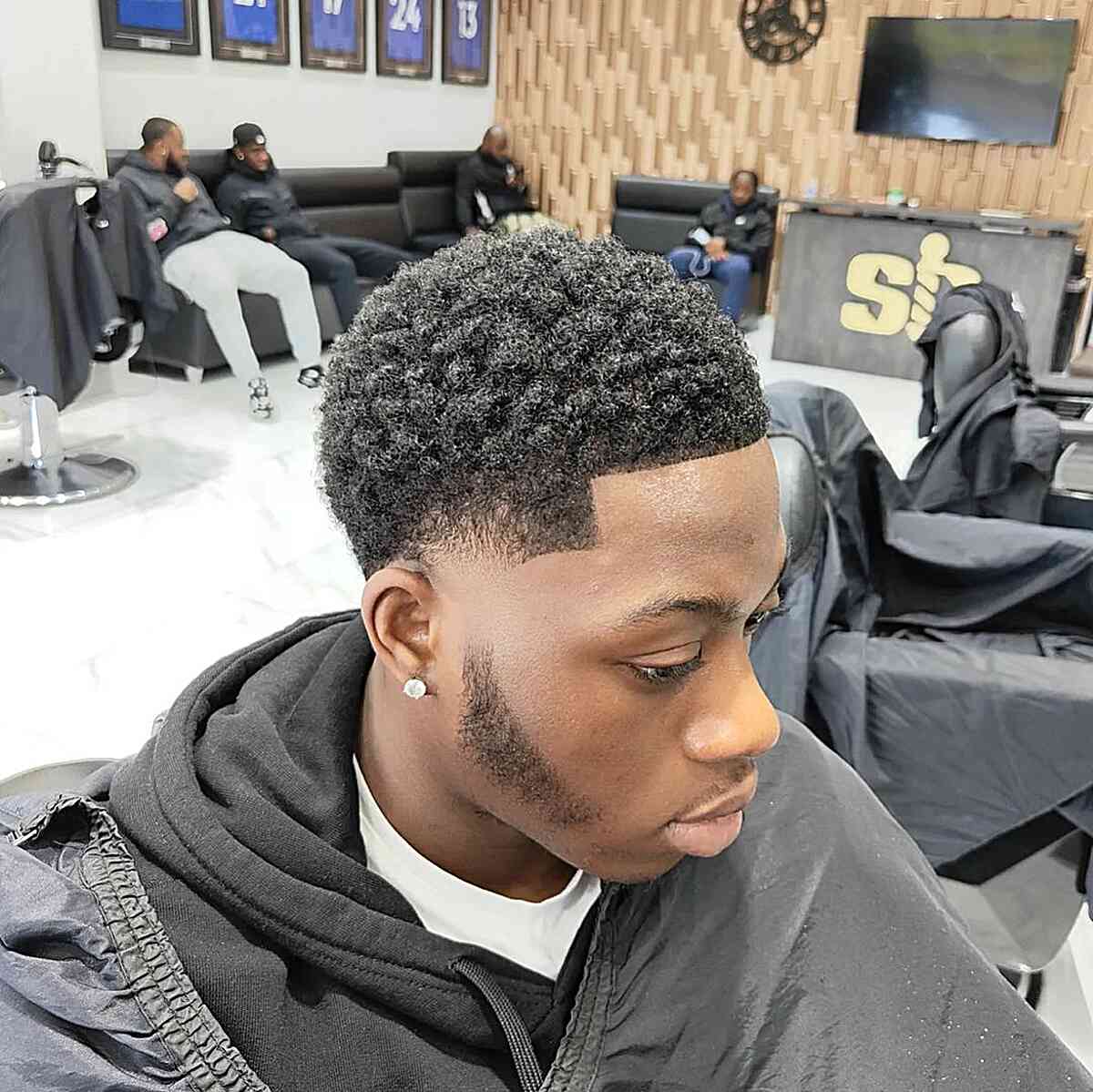 Picture of black man with twisted curls haircut