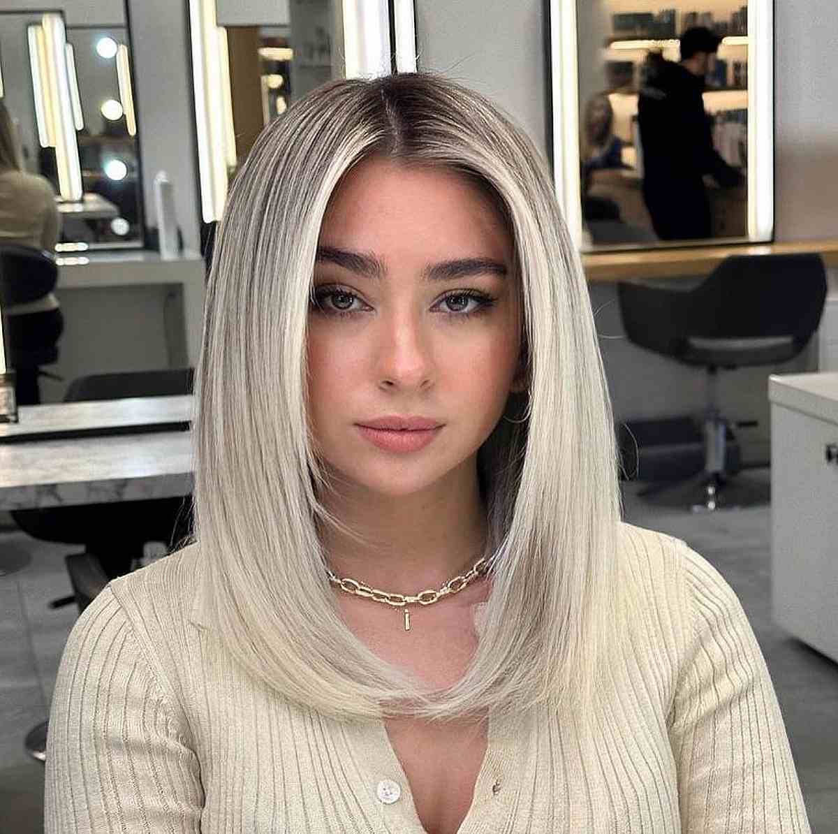 Black-Rooted Ash Blonde Style for Heart Faces