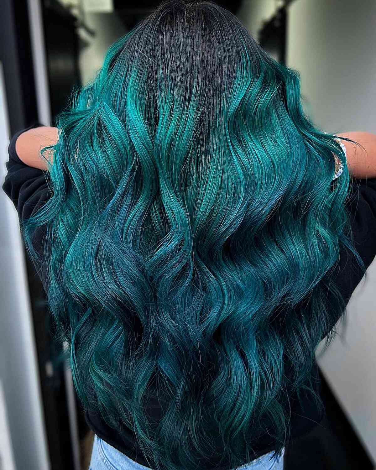 Black to Teal Color Melt Hair for ladies with long wavy hair