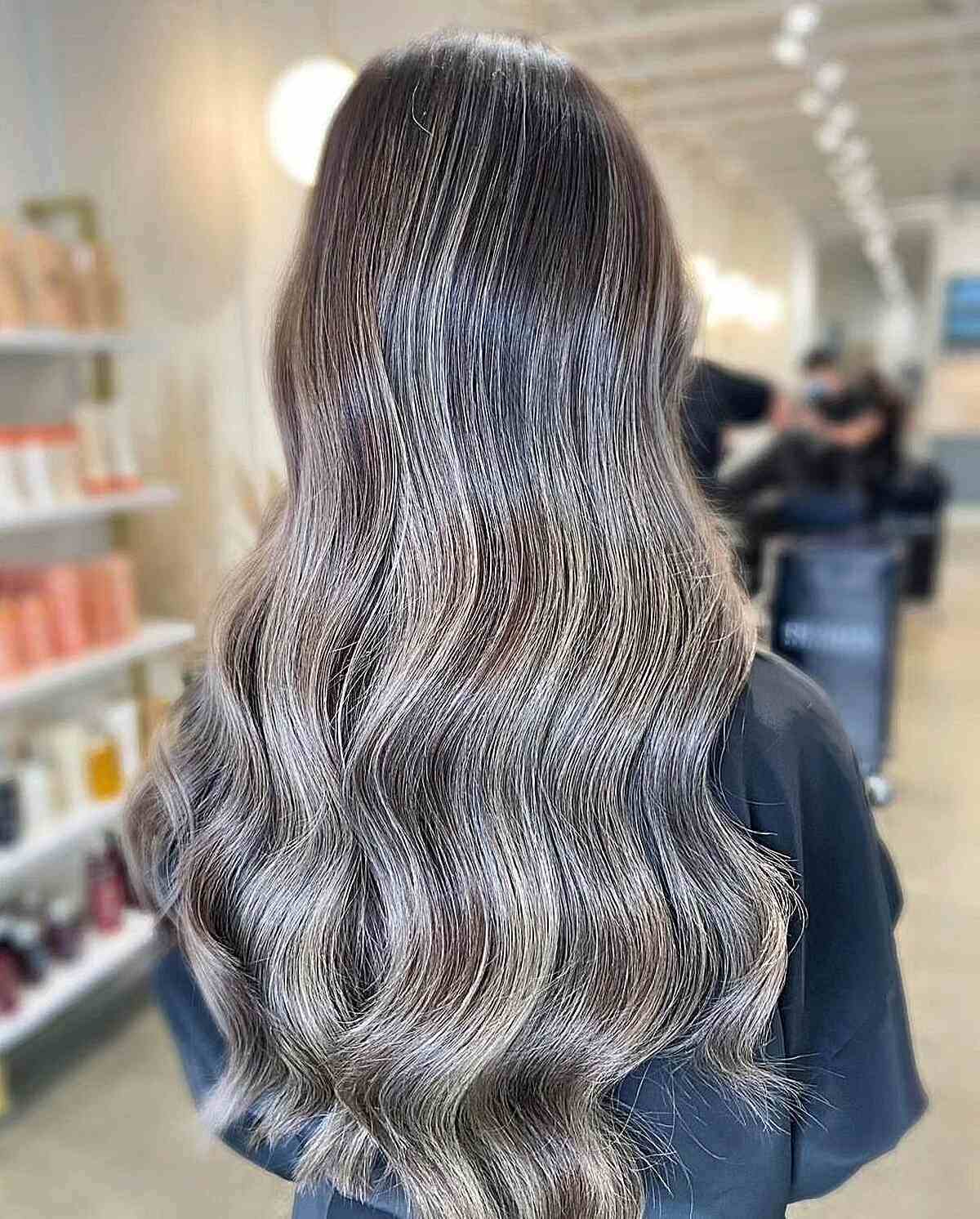 Blended Ash Grey Highlights on Long Wavy Dark Brunette Hair