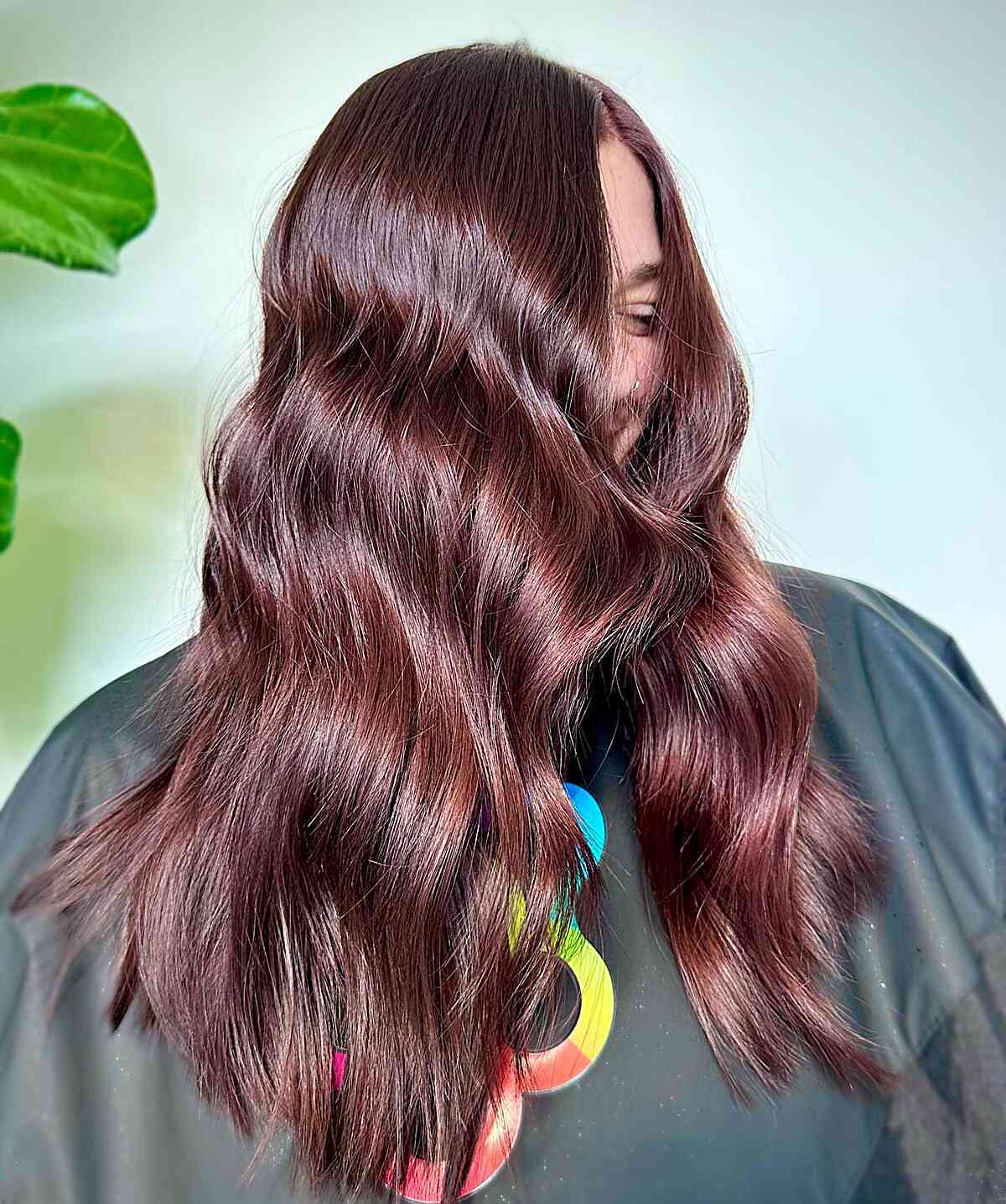 Blended Cherry and Mahogany Highlights on Longer Locks with Choppy Ends