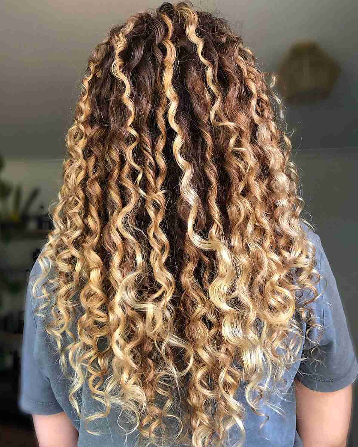 Blonde balayage with curls