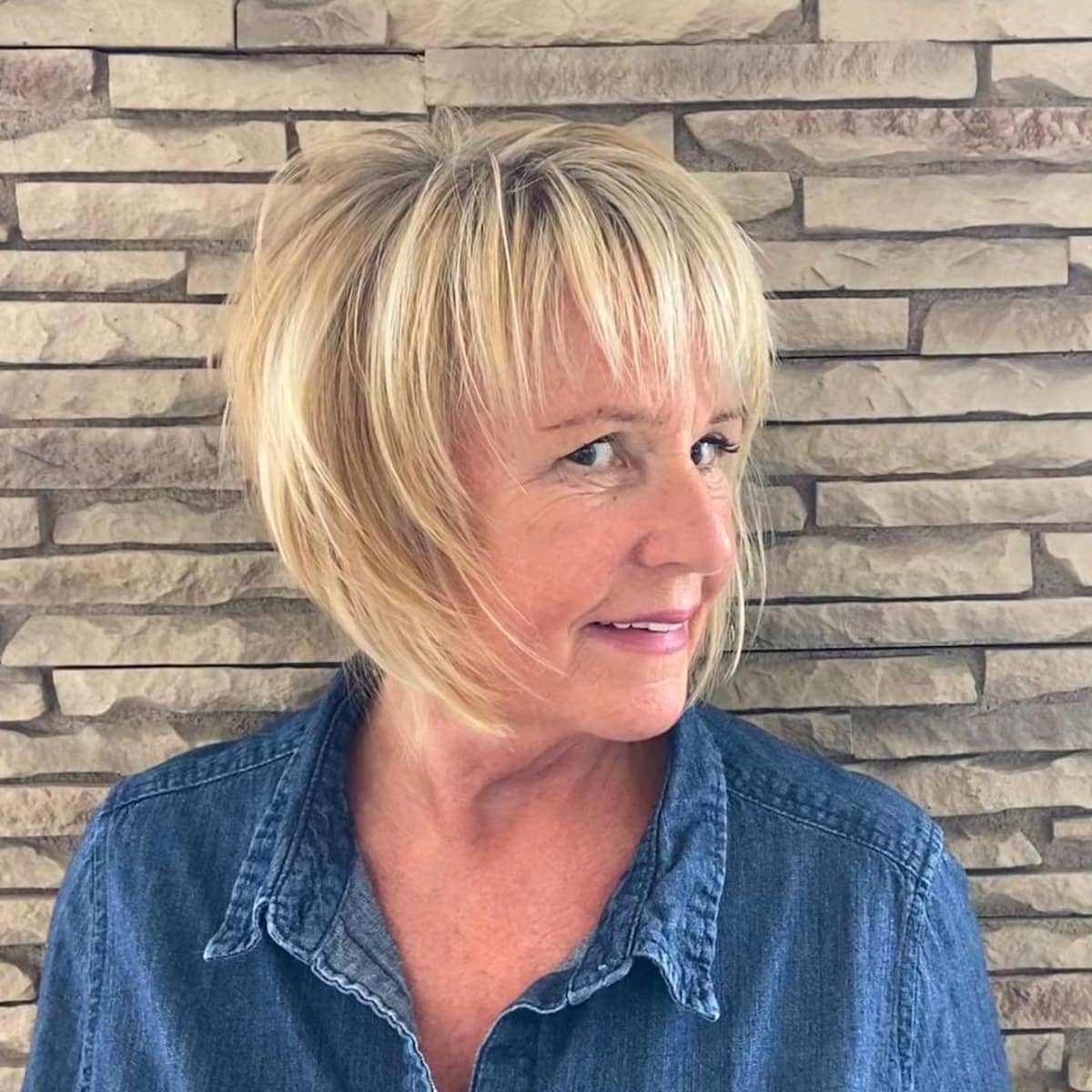 Blonde bob with bangs for chin-length thick haired women over 50