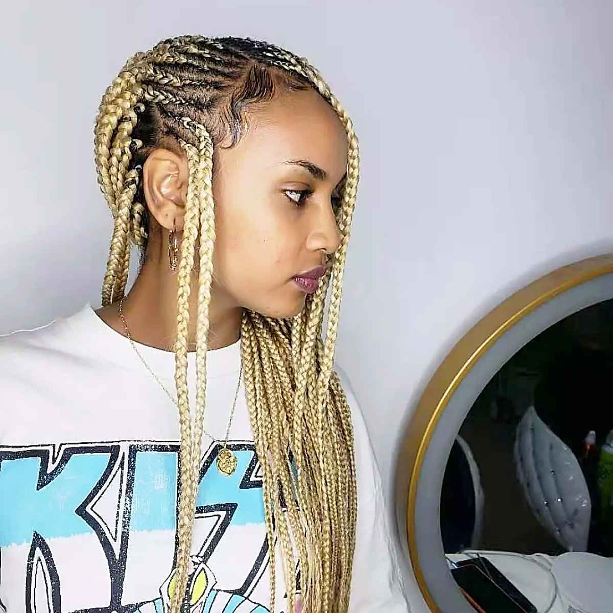Blonde box braids with front cornrows
