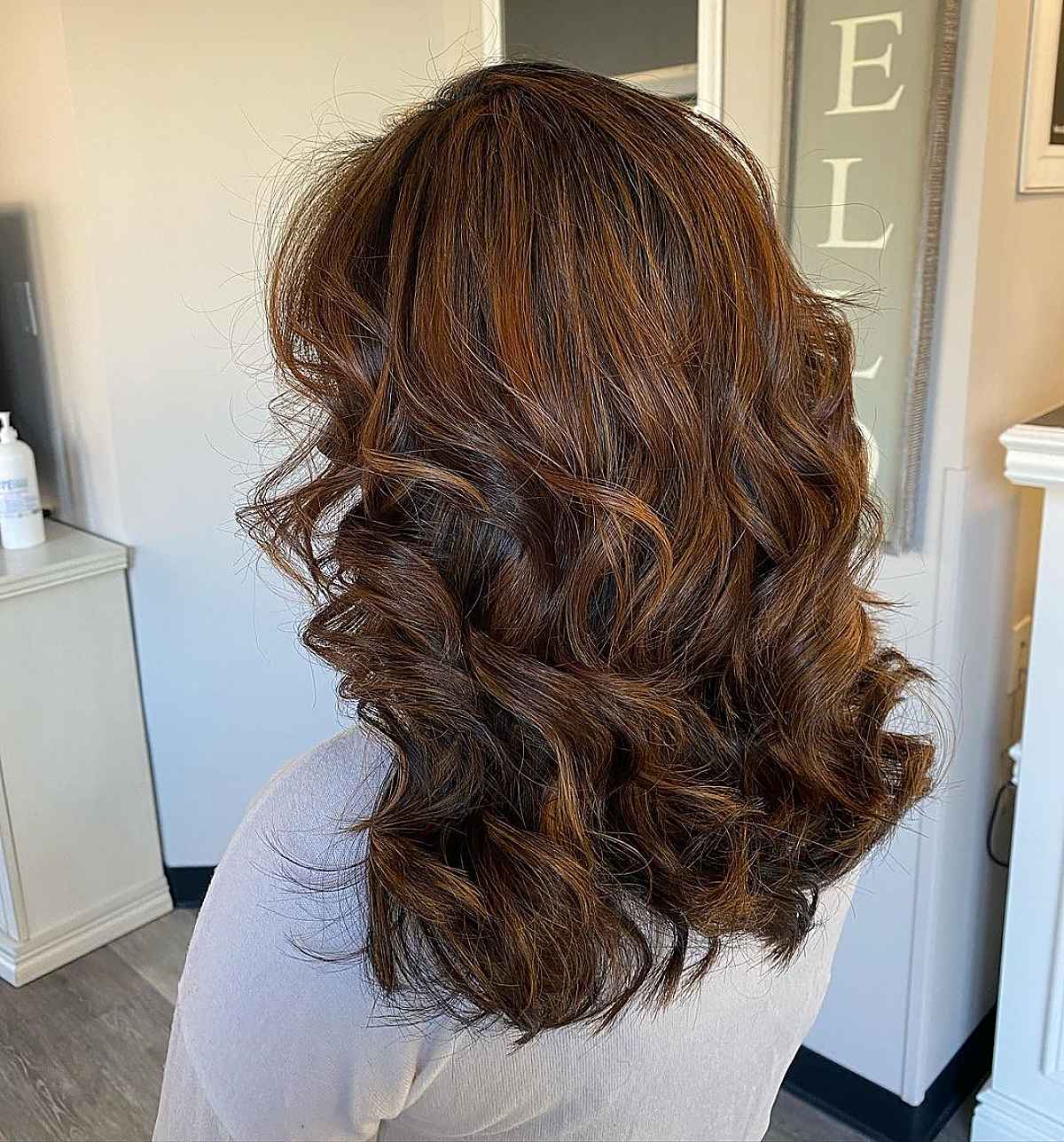 Blonde-copper highlights on dark hair