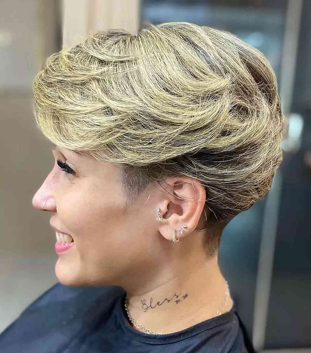 Blonde Feathered Bob with a Tapered Neckline