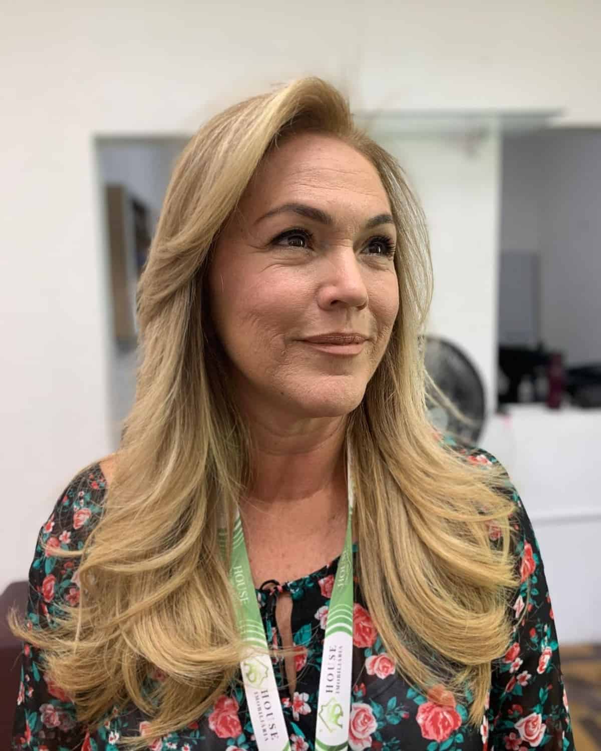 Blonde hair with long waves for women in their 50s