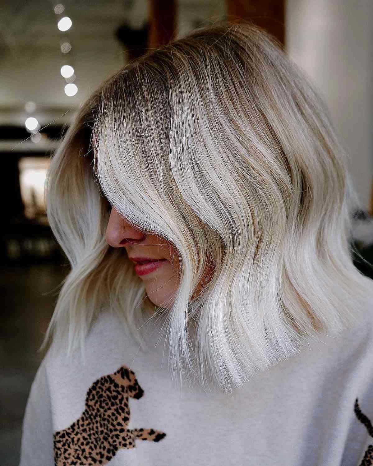 Blonde Hand-Painted Highlights with Dark Roots