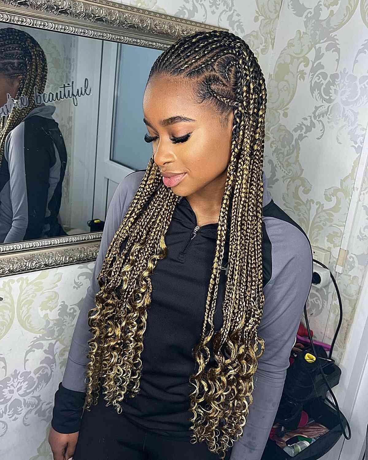 Blonde Knotless Fulani Braids with Curly Ends and Heart-Shaped Part
