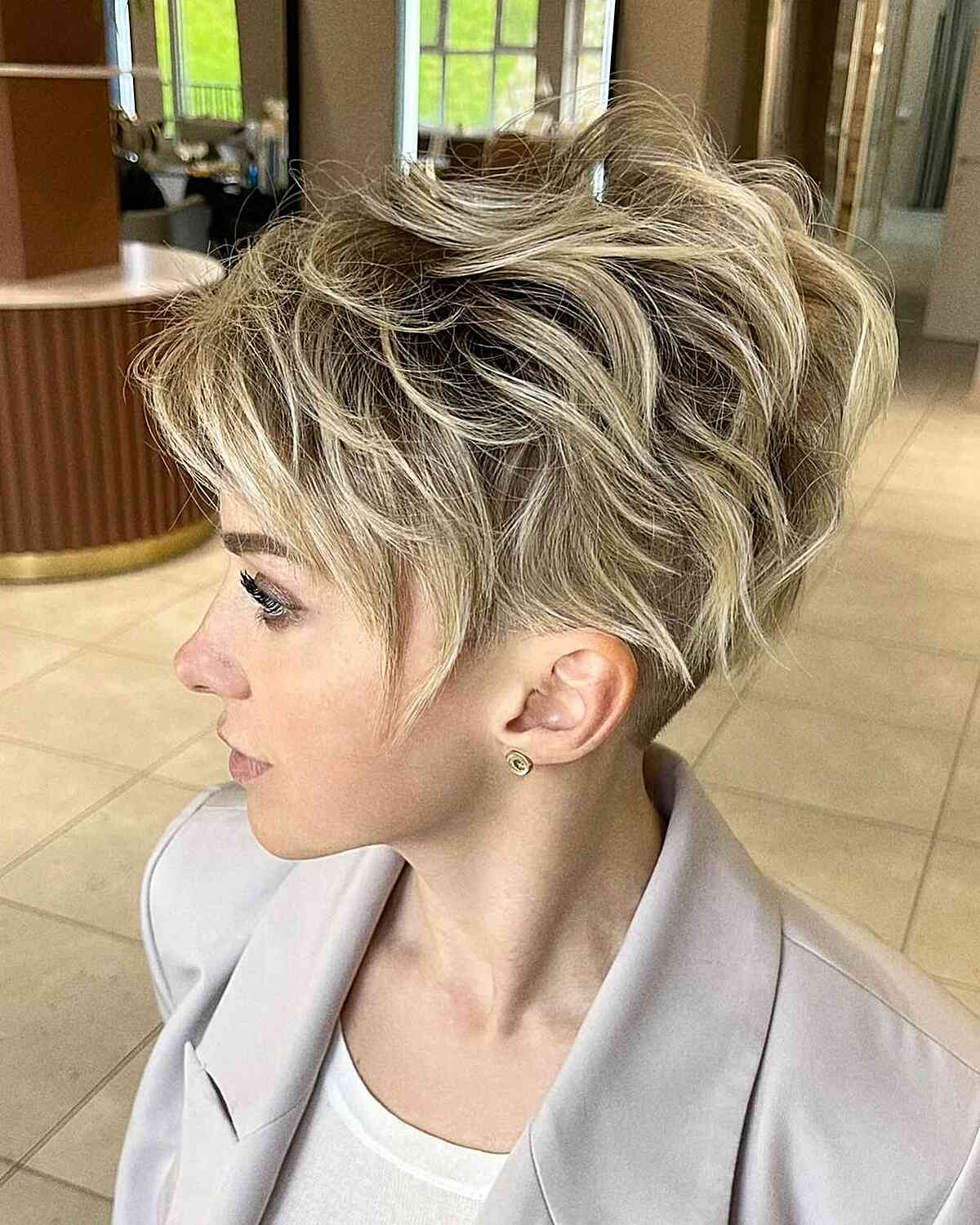 Blonde Messy Long Pixie Cut for women with short hair and darker roots
