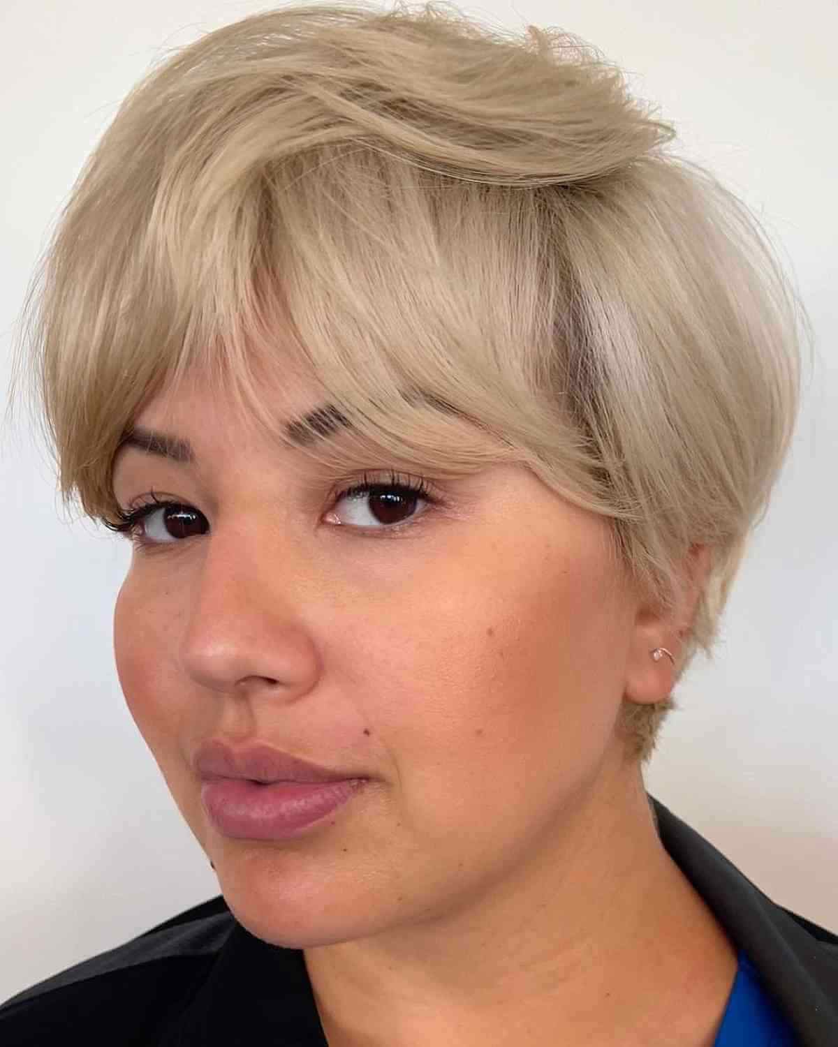 Blonde Pixie with Bottleneck Bangs