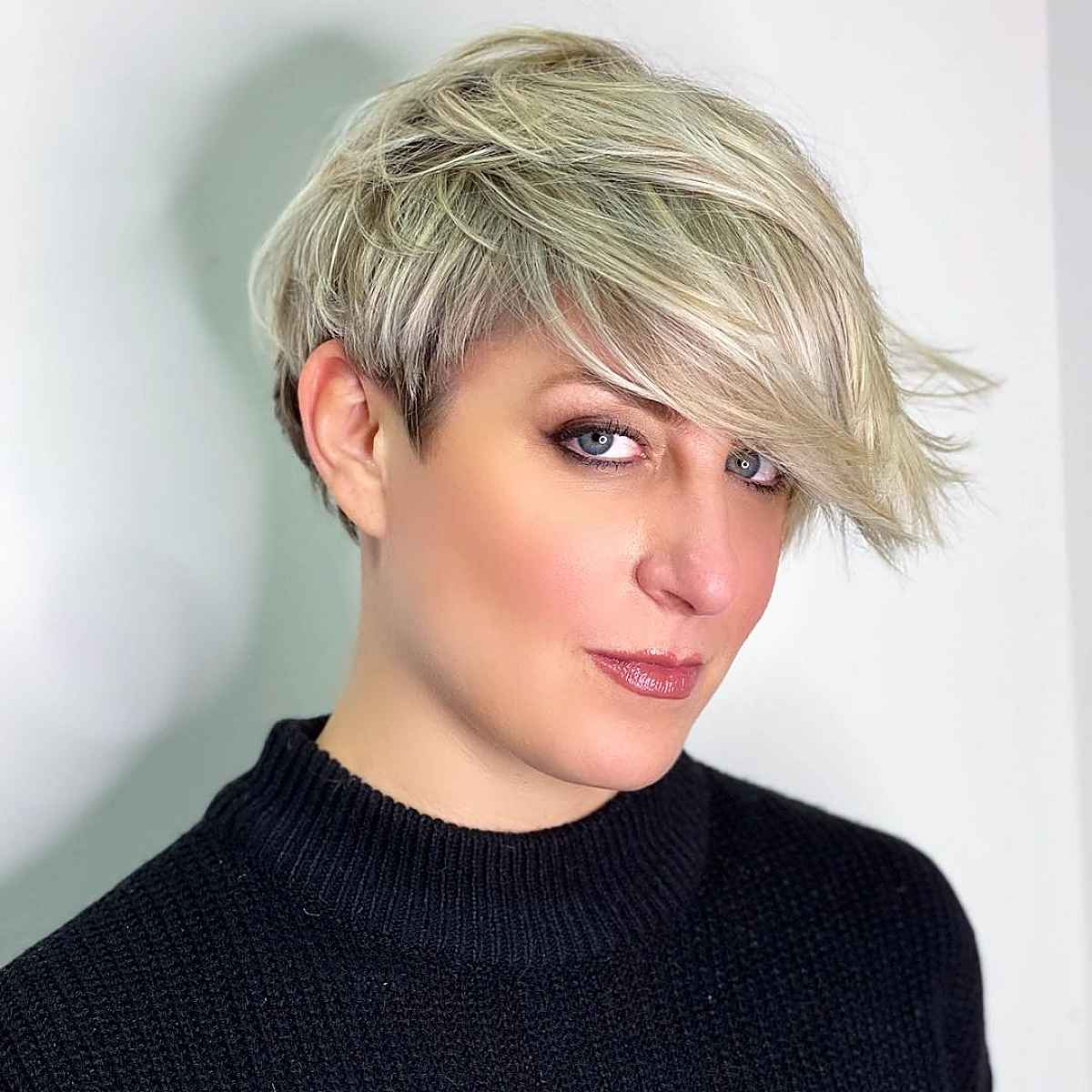 Blonde Pixie with Long Side-Swept Bangs