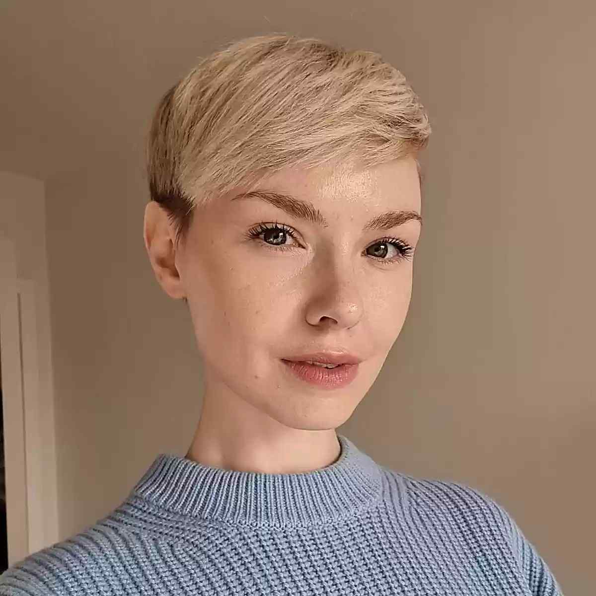 Warm and Light Blonde Short Hair with Side-Swept Bangs for Long Faces