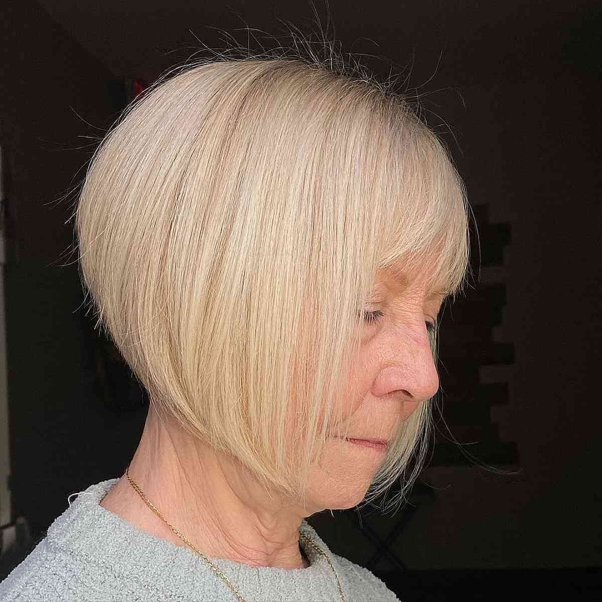 Blonde Stacked Bob with Bangs for Ladies in Their 70s
