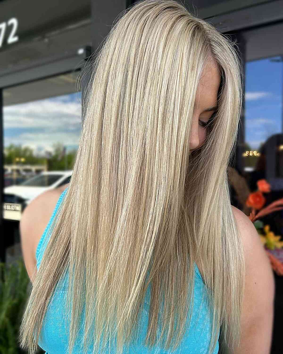 Chest-Length Blonde Straight Hair with Textured Ends for Graduation