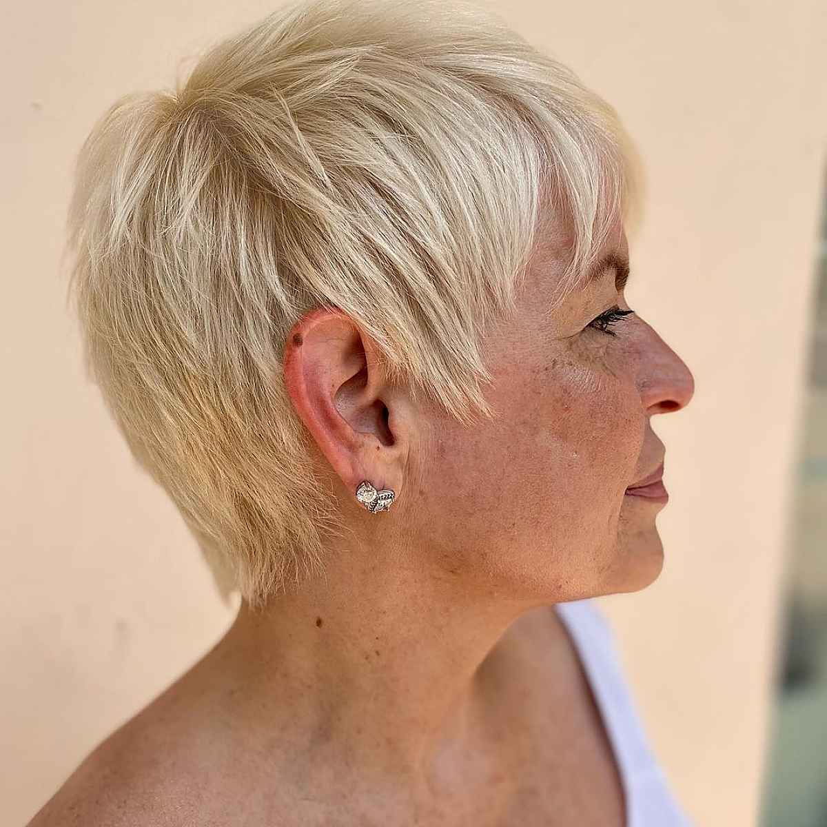 blonde younger-looking pixie cut