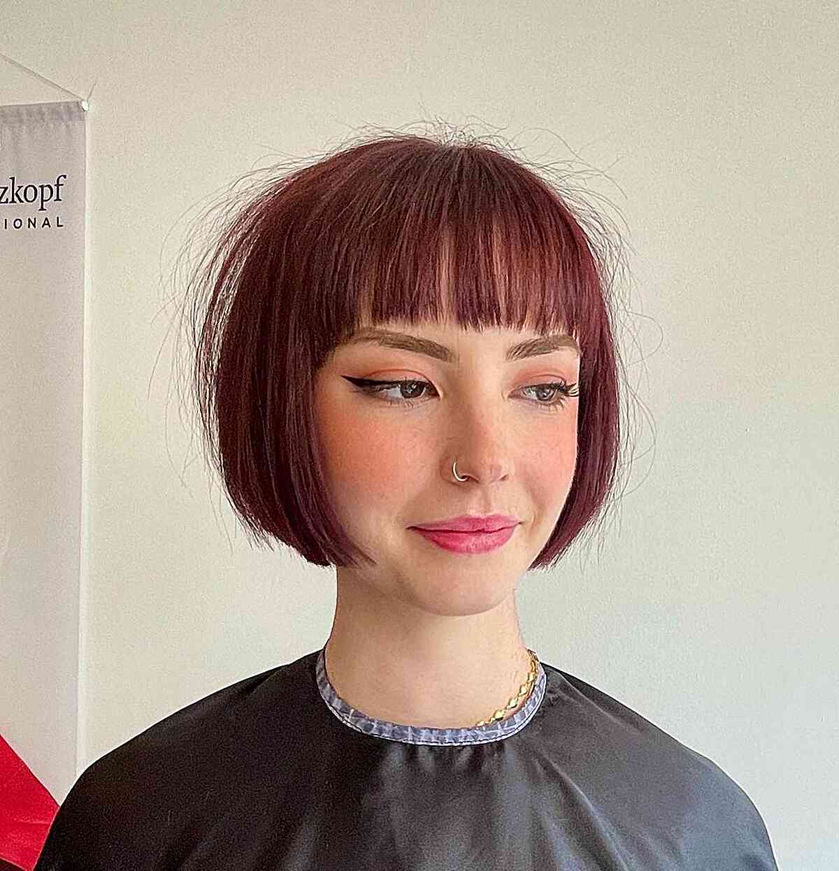 Chin-Length Blunt and Edgy Vibrant Bob Cut with Bangs 