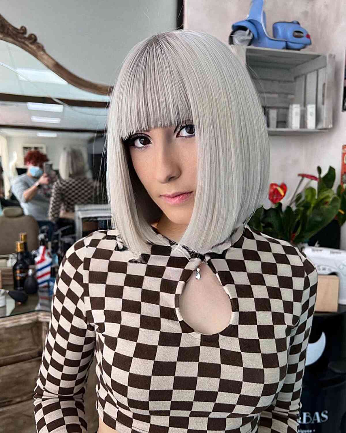 Neck-length Platinum Blunt Bangs on a Blunt Cut for Straight Hair for Long Face Shapes