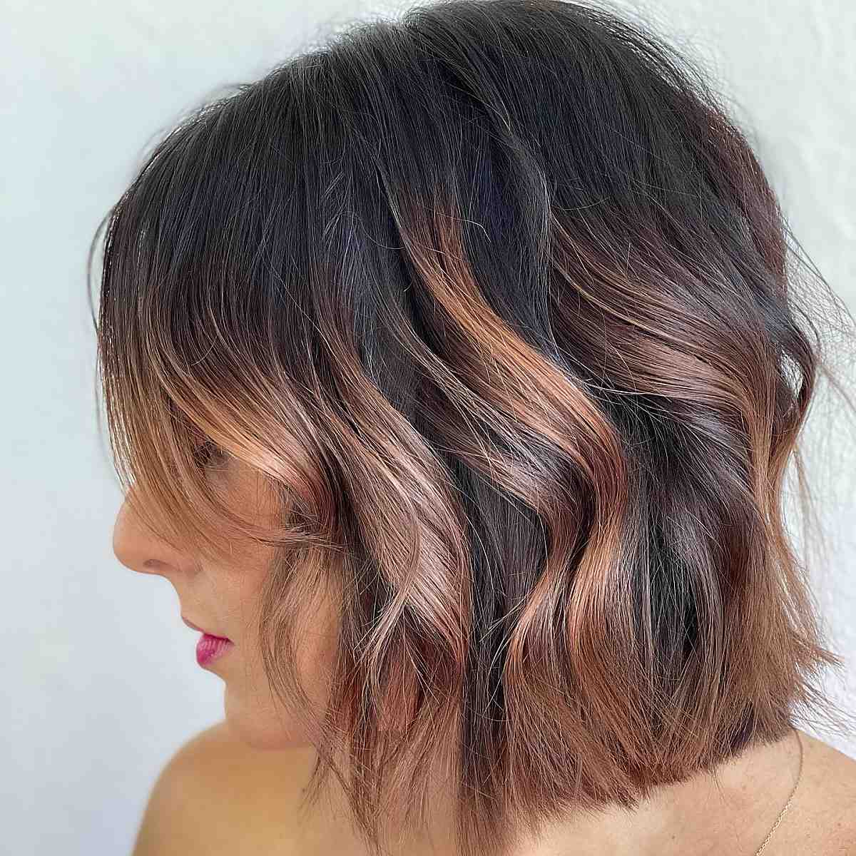blunt bob with rose gold highlights