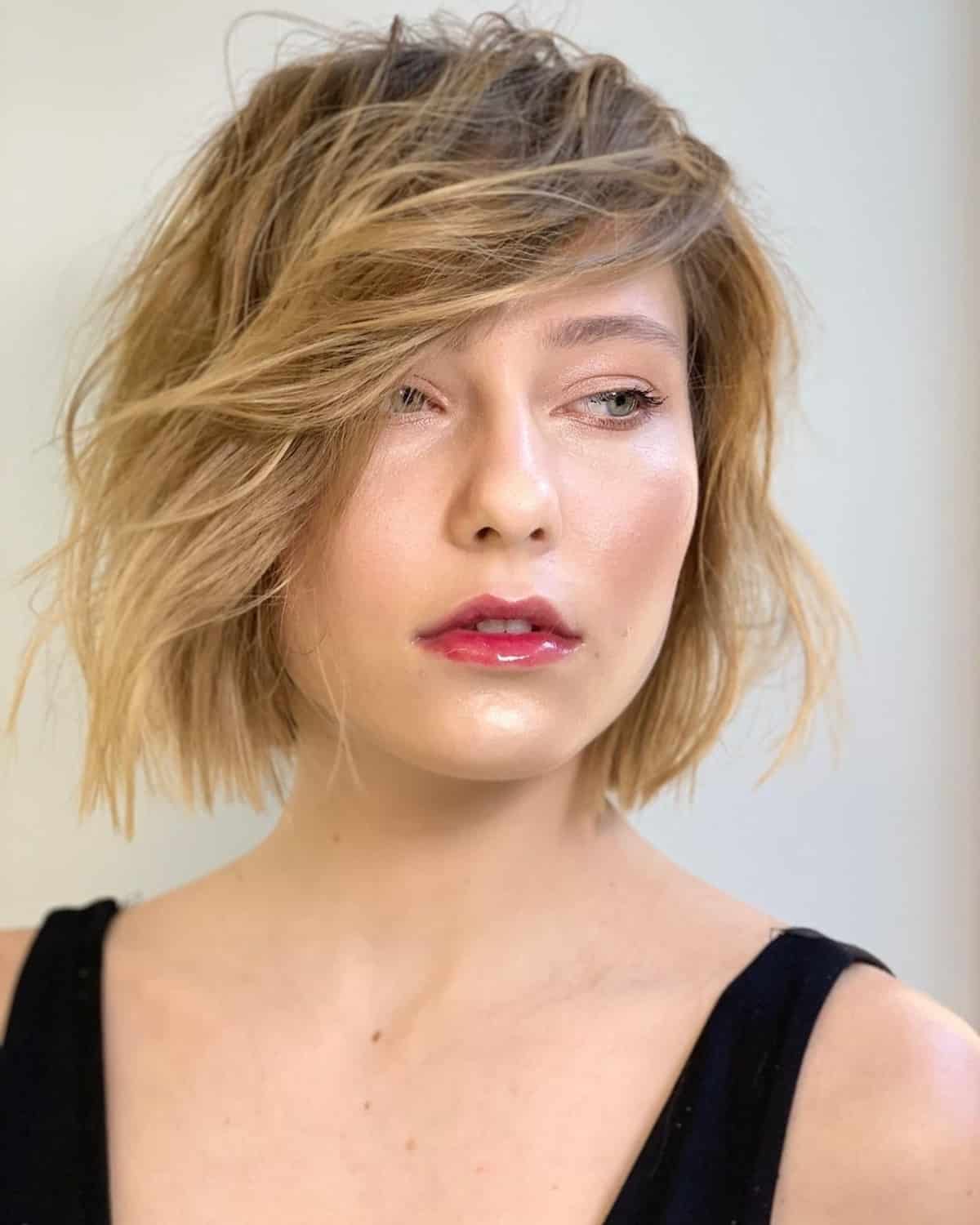 Blunt bob with side-swept bangs