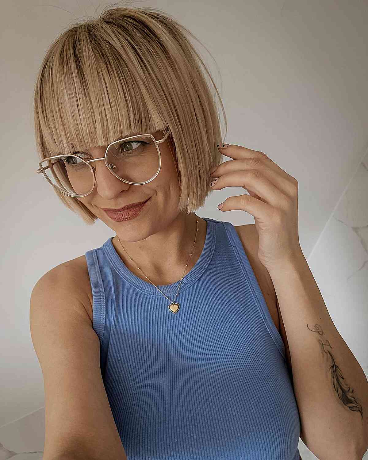 Blunt Cut Bob with Blunt Cut Bangs for short dark blondes with glasses