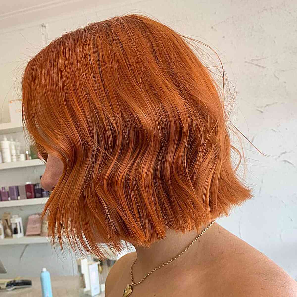 Blunt Cut Copper Bob for ladies with short hair