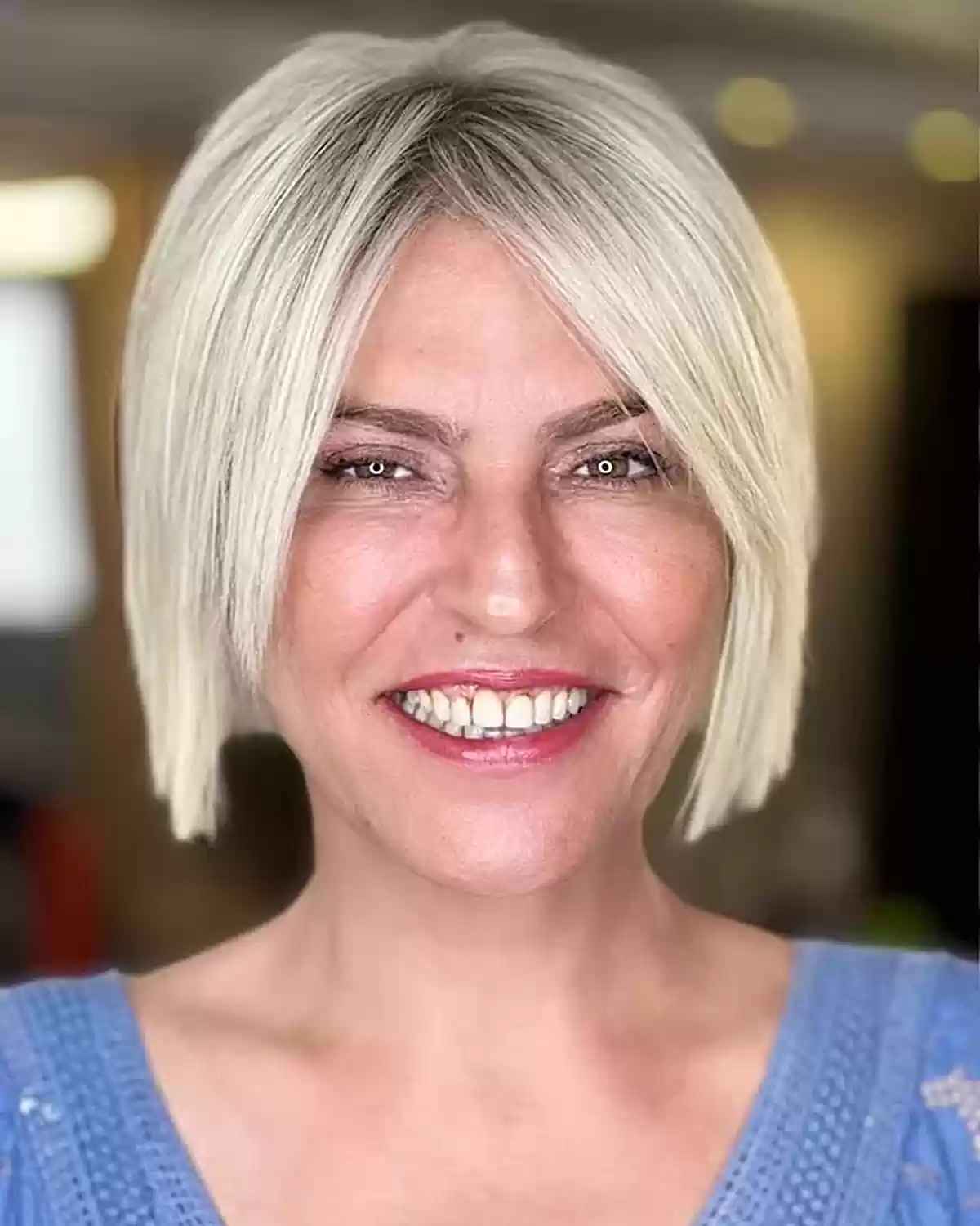 Blunt Jaw-Length Blonde Bob for Ladies Aged Fifty