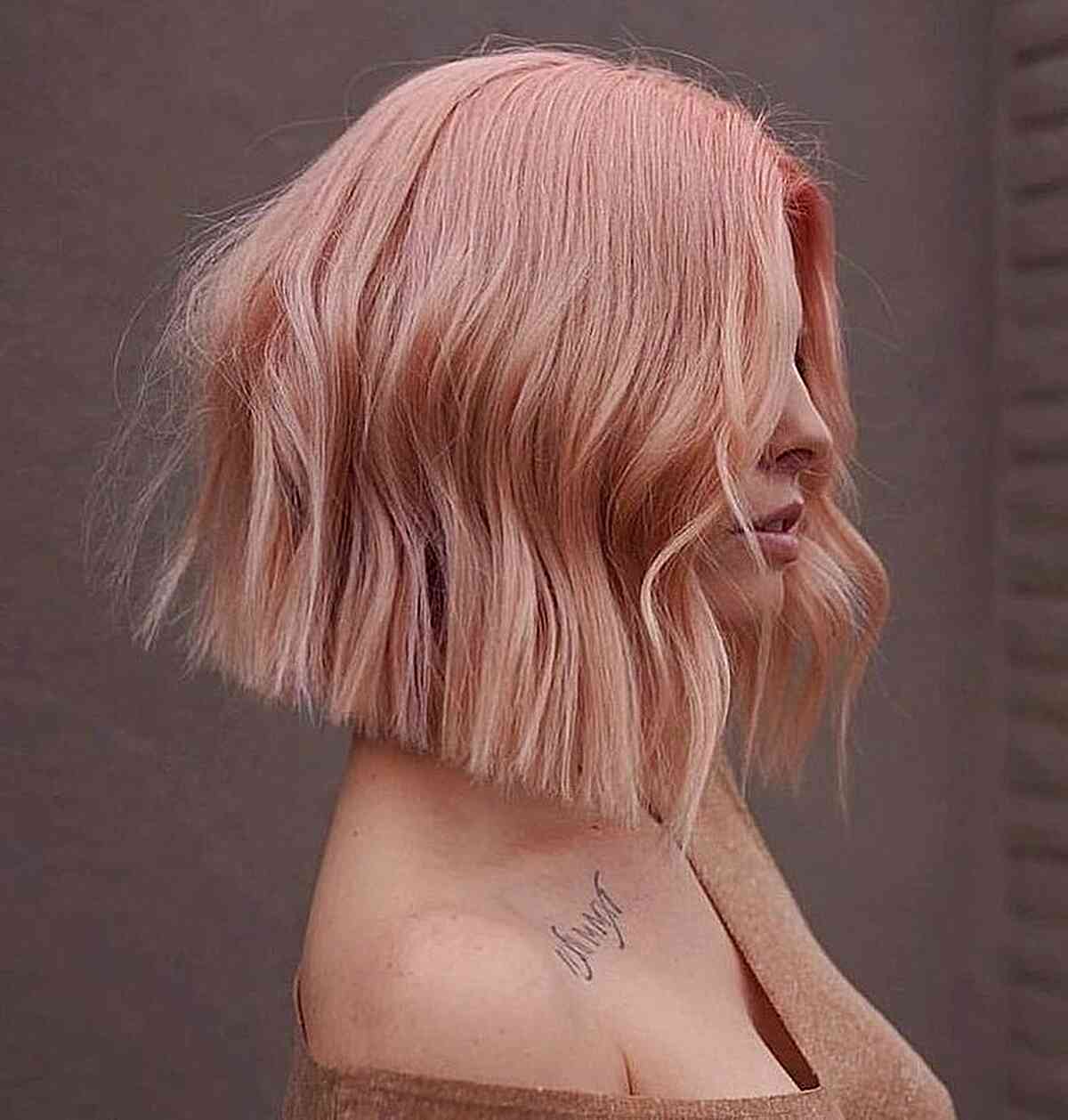 Blunt One-Length Rose Gold Bob Cut for women with straight hair