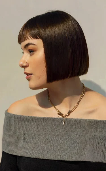 A Blunt Sharp Bob Cut with Short Bangs