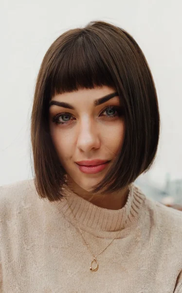 A Bob cut with blunt bangs