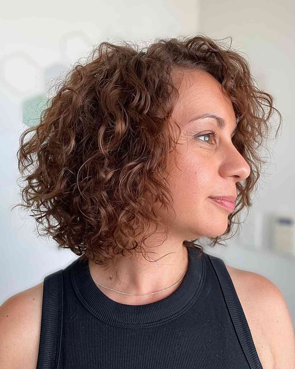 Bob Cut with Stacked Short Layers for Curly Thin Hair