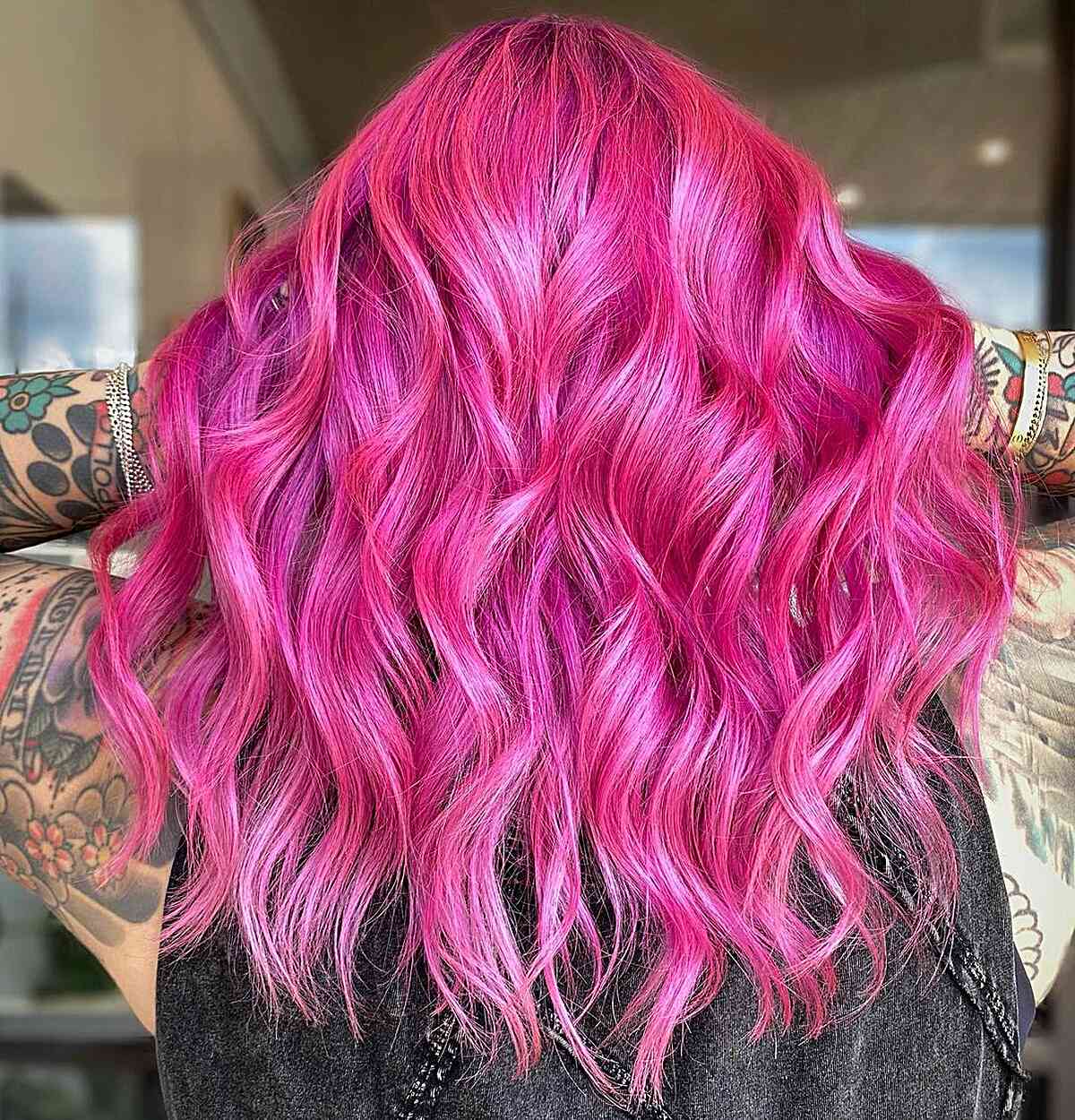 Bold and Vivid Hot Pink Hair Color for girls with an edgy style