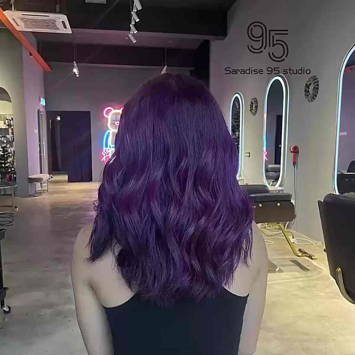 Mid-Length Bold Midnight Purple Hair with Waves