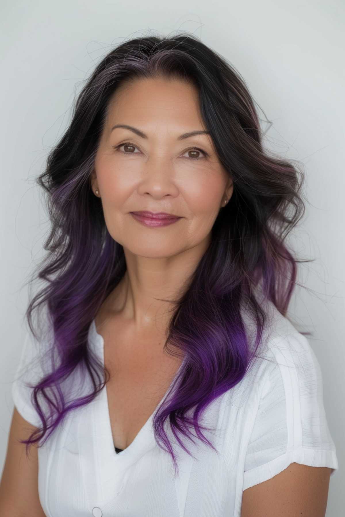 Long wavy hair with bold purple ombre, perfect for medium to thick hair types