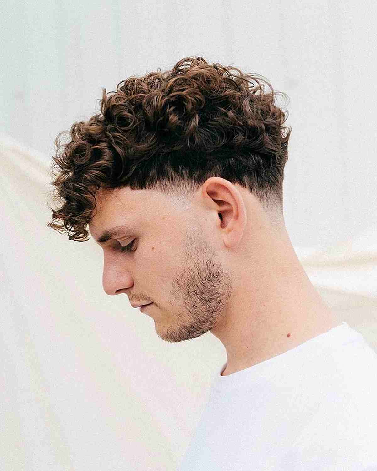 Bouncy Curls with Low Taper Fade for Guys