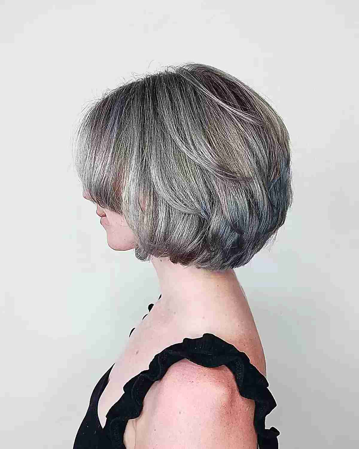 Neck-Grazing Bouncy Layered Bob with Icy Highlights