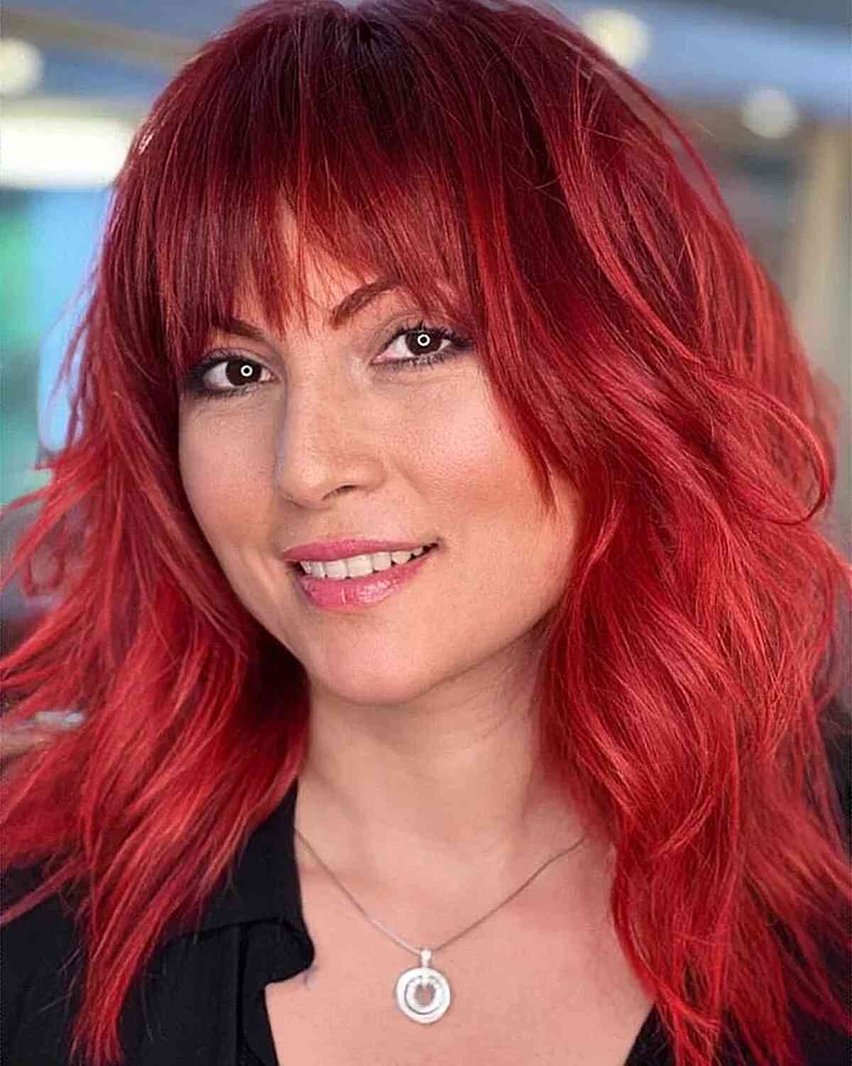 Bright and Vivid All-Over Red Hair for women with an edgy style