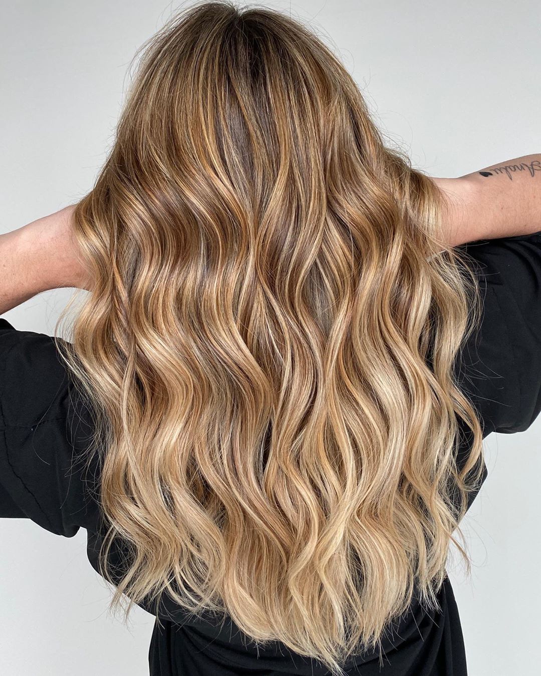 bright blonde hair with caramel highlights