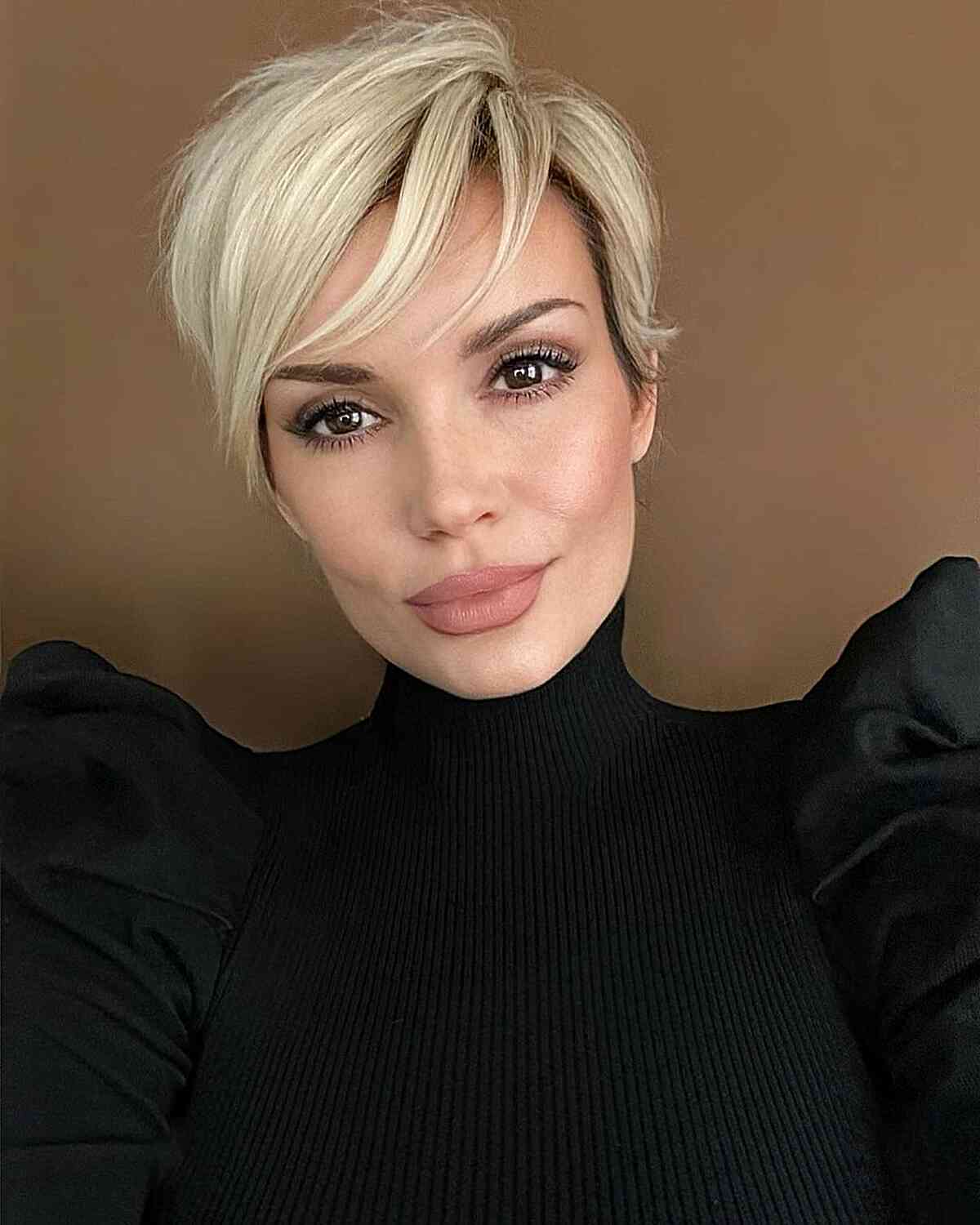 Bright Blonde Pixie Hair with Piece-y Side Bangs