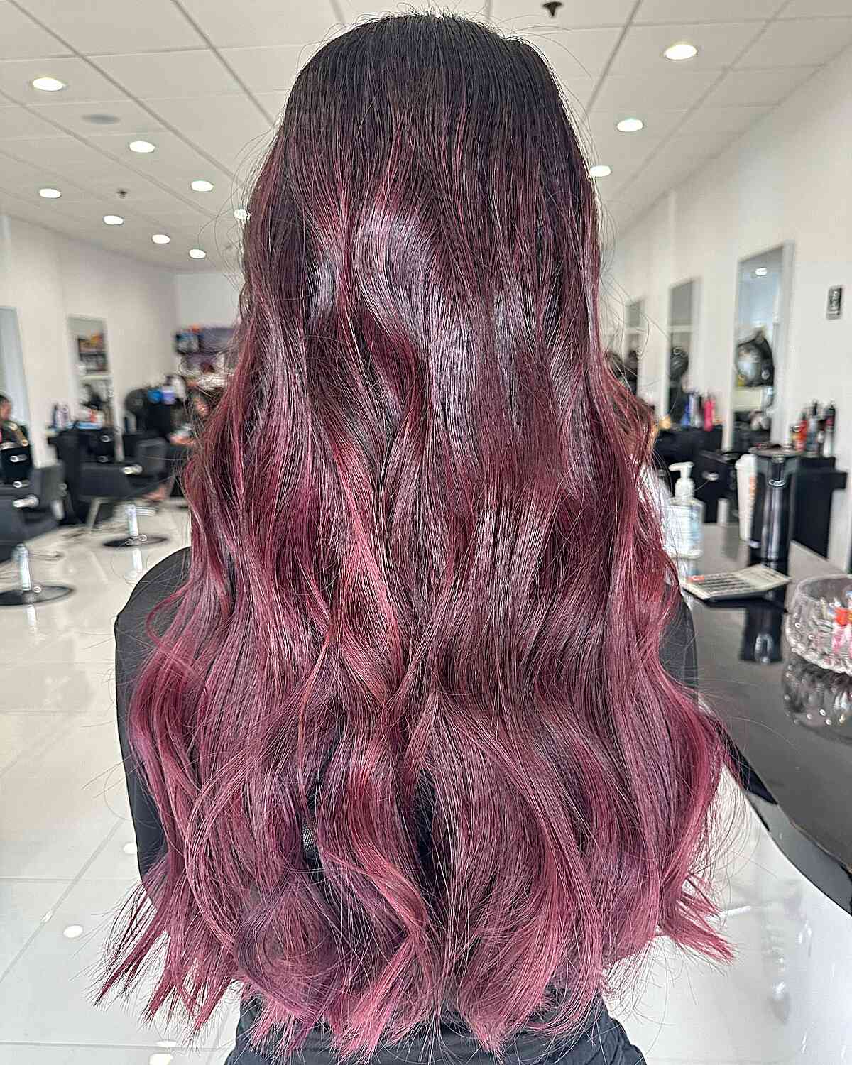 Bright Burgundy Balayage Highlights for Long and Thick Tresses