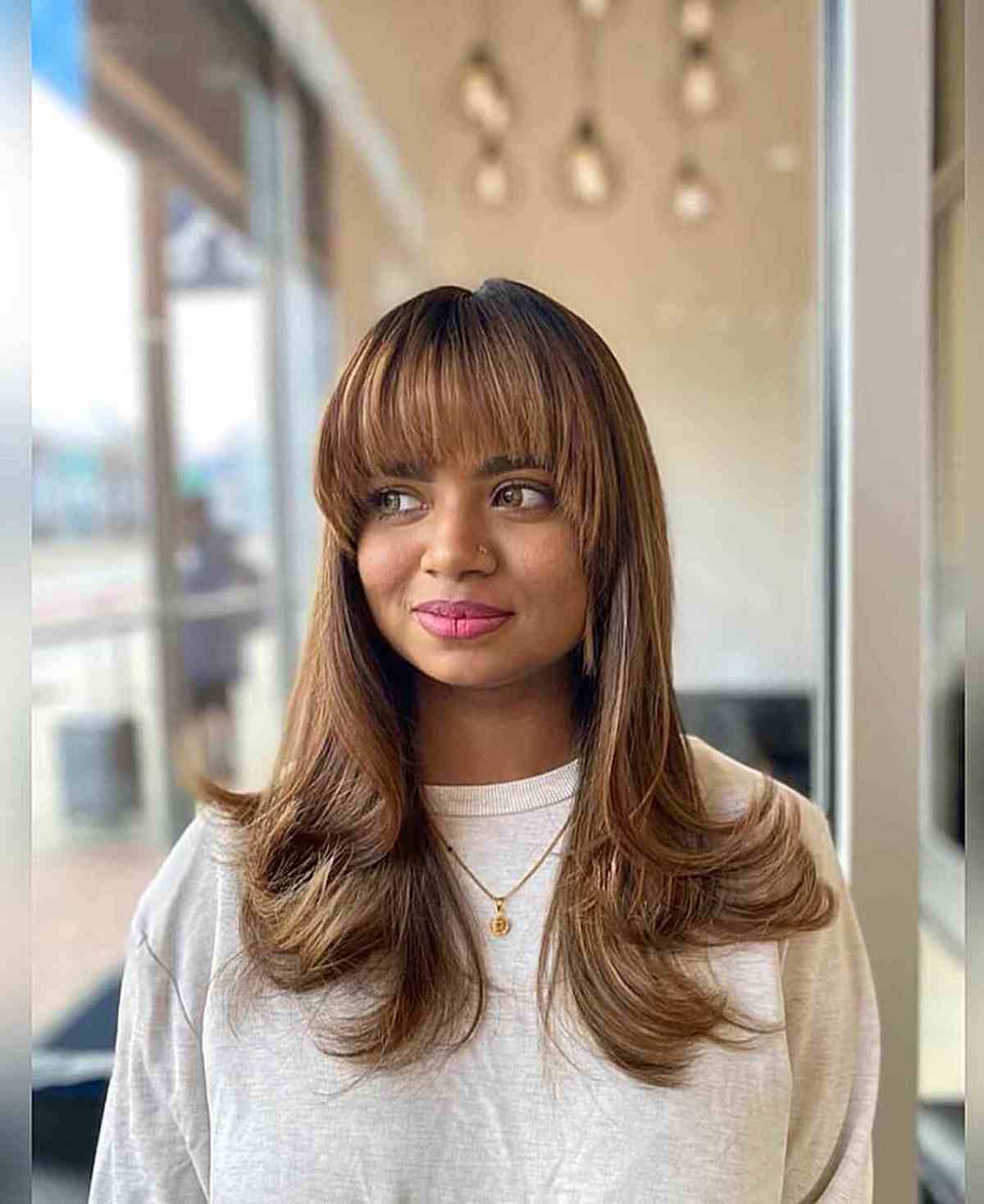 Bright Chocolate Brown Balayage with Arch Bangs for Mid-Long Haircut